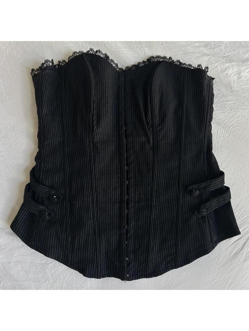 Black pinstripe corset top with lace trim and adjustable straps
